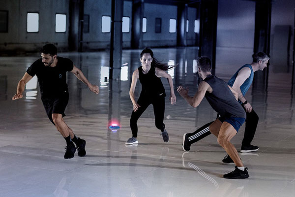 Group exercise with BlazePod wireless fitness technology light modules