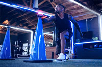 Male athlete training with BlazePod wireless modules