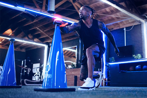 Male athlete training with BlazePod wireless modules