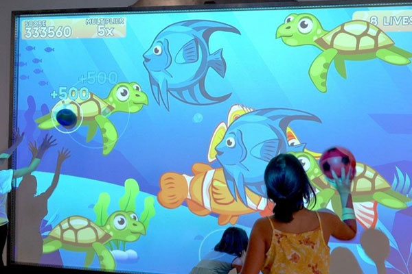 kids playing ocean game on multiball